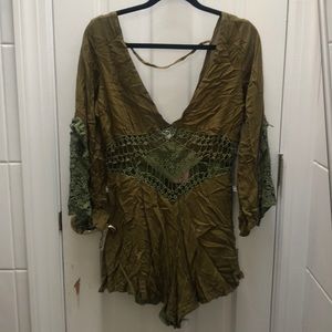 Green crocheted romper